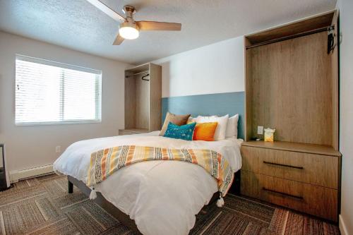 a bedroom with a bed and a ceiling fan at Private Home Perfectly Located at Brighton Ski Resort! in Brighton