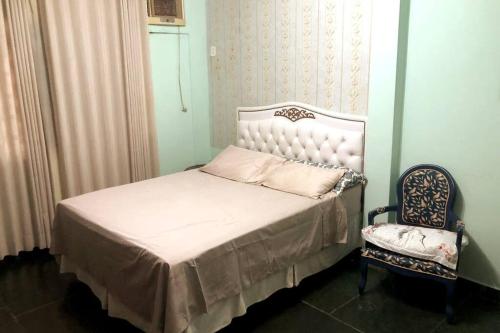 En eller flere senge i et værelse på Casa em região nobre com área Gourmet e Jacuzzi