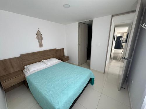 Ένα ή περισσότερα κρεβάτια σε δωμάτιο στο Apartamento en Coveñas
