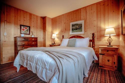 Ένα ή περισσότερα κρεβάτια σε δωμάτιο στο Storm Mountain Escape