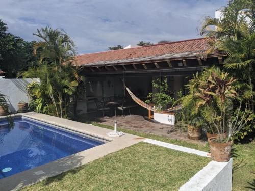 Πισίνα στο ή κοντά στο BELLISIMA CASA A 15 minutos de CUERNAVACA