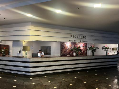 Ο χώρος του λόμπι ή της ρεσεψιόν στο Real Residence coworking, conforto e piscina para até 5 pessoas