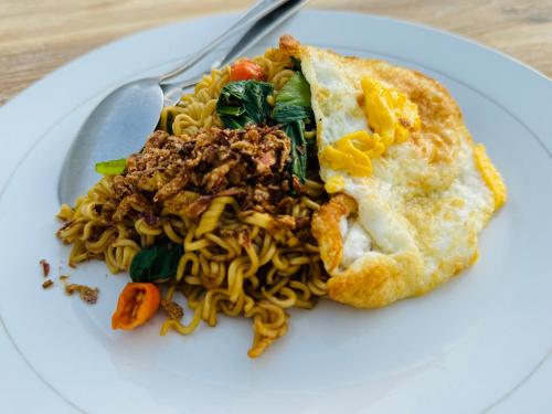 ゲストハウスの敷地内または近くでの食事または食べ物