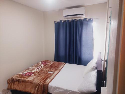 Katil atau katil-katil dalam bilik di 3 bedroom Deluxee