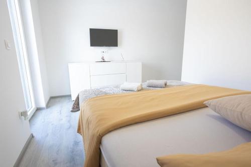 Ένα ή περισσότερα κρεβάτια σε δωμάτιο στο Villa La Vita, Ljubuški