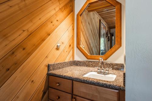 a bathroom with a sink and a mirror at Courchevel #15 - 2 Bedroom, 2 Bathroom, Sleeps 6! Just steps to Canyon Lodge! in Mammoth Lakes