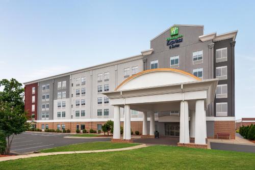 a rendering of the front of a hotel at Holiday Inn Express Hotel & Suites Fredericksburg by IHG in Fredericksburg
