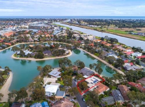 an aerial view of a town next to a river at Lakefront 4 Br House At Patterson Lake Kayakbbq in Patterson Lakes