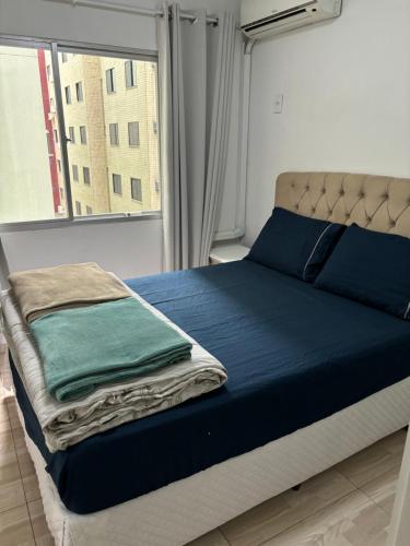 Postel nebo postele na pokoji v ubytování Apartamento na quadra mar