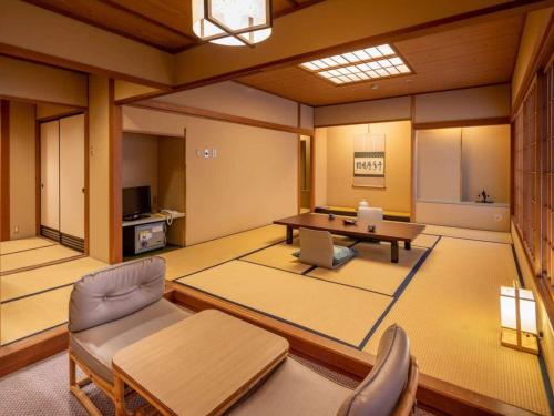 Posezení v ubytování RYOKAN OQOQ-Tamai Bekkan