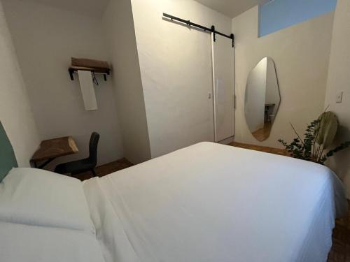 Ένα ή περισσότερα κρεβάτια σε δωμάτιο στο Am Cinco Condesa