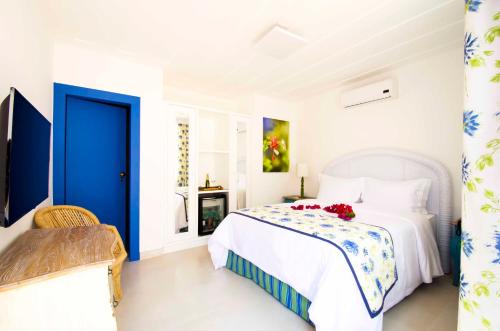 Hotel Solar do Arco tesisinde bir odada yatak veya yataklar