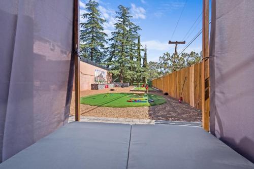 an open window of a building with a view of a playground at Rosequartzplayhouse Wgmrm&more! in Sedona