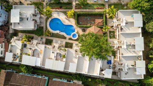 an aerial view of a house with a swimming pool at Coco Boho Beach Condo in Coco