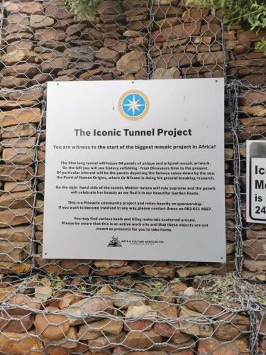 a sign on the side of a building at Pinnacle Point 2-bedroom self-catering apartment in Mossel Bay