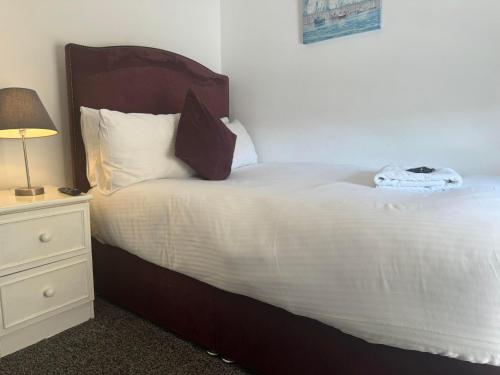 Ένα ή περισσότερα κρεβάτια σε δωμάτιο στο The Jubilee Hotel East - with NEWLY REFURBISHED SPA FACILITIES - GAMESPIT - AND SMOKEHOUSE