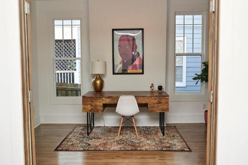 a home office with a desk and a chair at Modern & Spacious Home Near Downtown Atlanta in Atlanta
