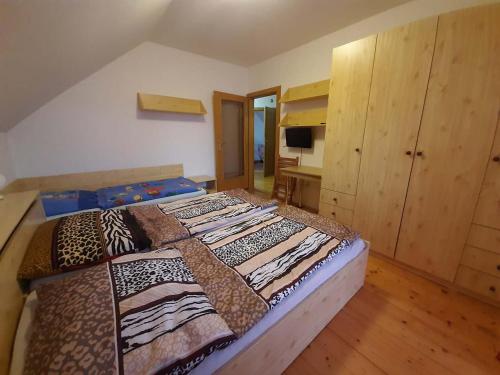 Postel nebo postele na pokoji v ubytování Apartmány Herry