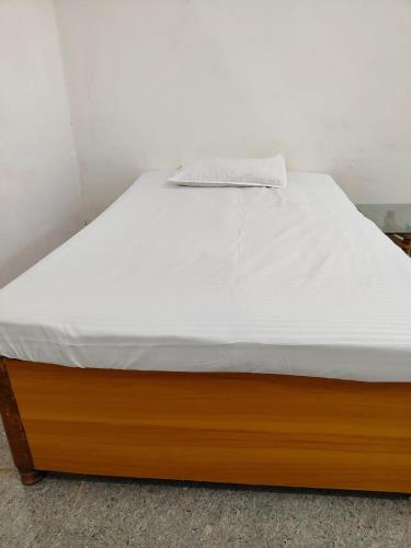 Ένα ή περισσότερα κρεβάτια σε δωμάτιο στο Welcome Home