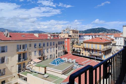 a view of a city from a balcony at Aparthotel AMMI Nice Massena - ex Ajoupa in Nice