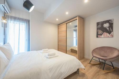 Postel nebo postele na pokoji v ubytování Modern Apartment
