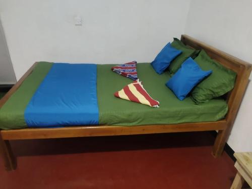 Ένα ή περισσότερα κρεβάτια σε δωμάτιο στο NR Villa Nilaveli