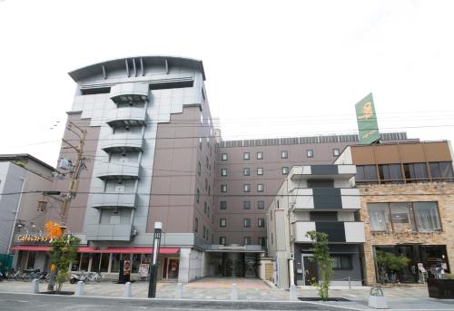 a building on a city street with at Nara Washington Hotel Plaza in Nara