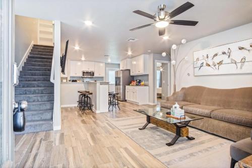a living room with a couch and a table at 5BR Home 3 mins Wiley Post, Sleeps 12 #CO in Bethany