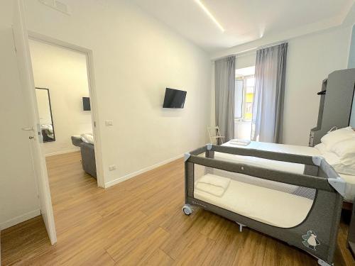 Postel nebo postele na pokoji v ubytování Lexie Suites