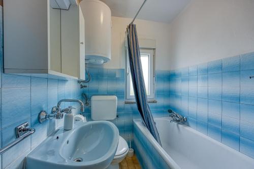 Koupelna v ubytování Apartment Basic