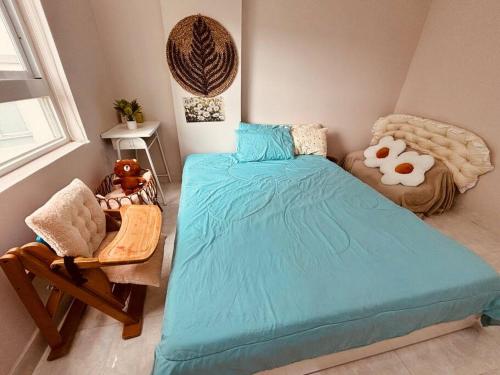 Кровать или кровати в номере Daisy Home Cozy