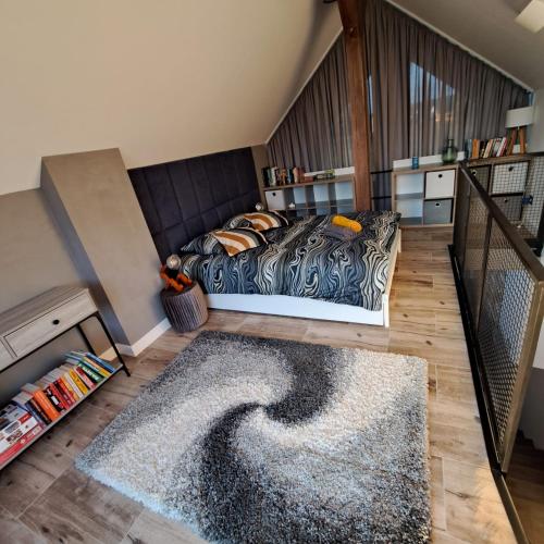 a bedroom with a bed with a zebra rug at Chill in Lubrza in Lubrza