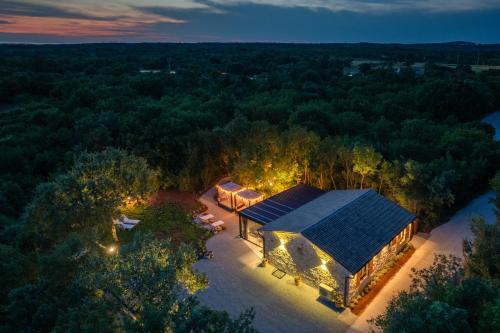 an overhead view of a house with lights on it at Casa al Lavere' in Bale