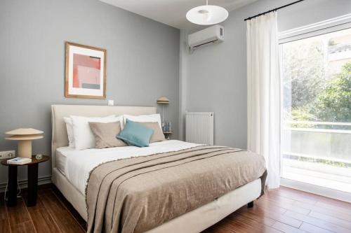 Faliro Seaside Retreat 2BD Apartment by UPSTREET