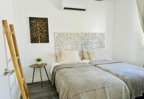 Postel nebo postele na pokoji v ubytování Villa Tami