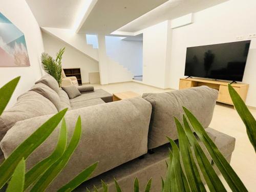 TV a/nebo společenská místnost v ubytování Villa Tami