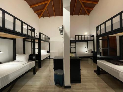 Postel nebo postele na pokoji v ubytování Another World Hostel Sigiriya