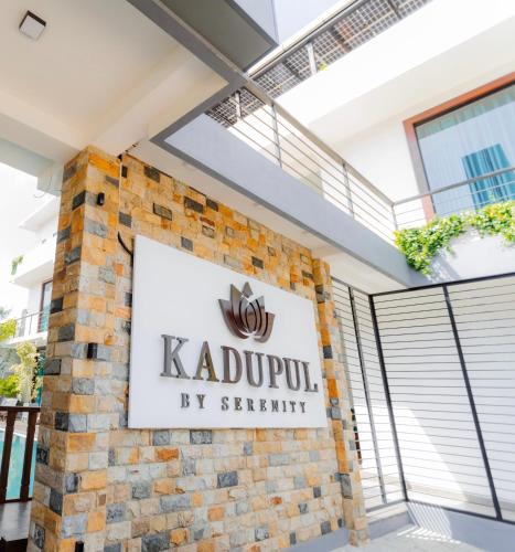 a sign on the side of a building at KADUPUL By Serenity in Negombo