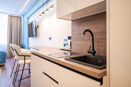 Køkken eller tekøkken på Bel Air Apartments