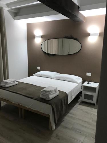 Ένα ή περισσότερα κρεβάτια σε δωμάτιο στο Borgo Guazzo Flat