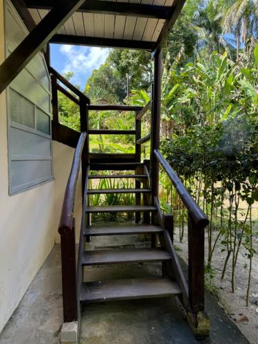 a set of stairs leading up to a building at Pousada Horizonte Azul in Ilha de Boipeba