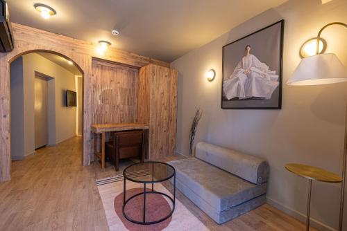 a living room with a couch and a table at Tare Houses in Istanbul