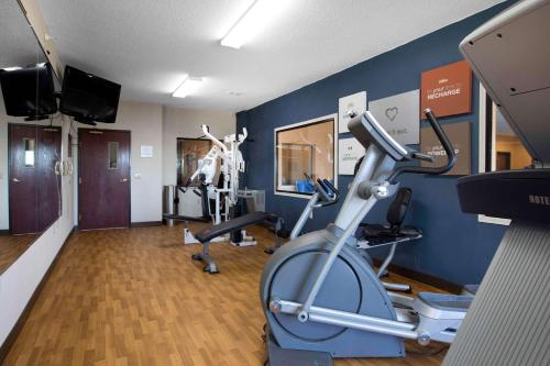 a gym with exercise bikes and a treadmill at Comfort Suites Fort Wayne - Dupont in Fort Wayne