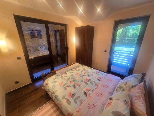 Postel nebo postele na pokoji v ubytování Villa Djuric