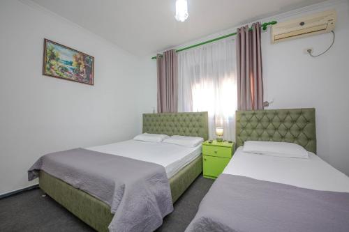 Postel nebo postele na pokoji v ubytování Hotel 3A