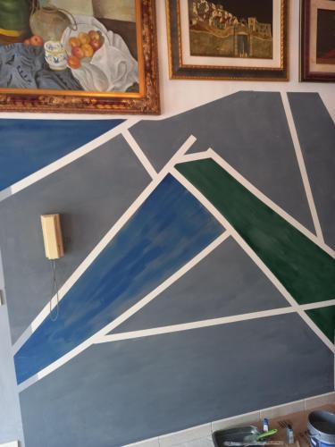a painting of a basketball court on a wall at D'ALTRITEMPI-Elegance in Cianciana. in Cianciana