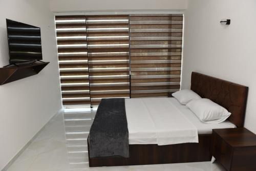 Postel nebo postele na pokoji v ubytování Hostel Jusaj Glob