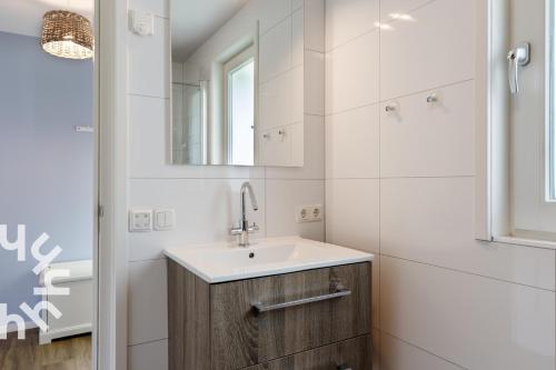 Ένα μπάνιο στο OV072 Exklusives 4P-Ferienhaus in bester Lage in Giethoorn