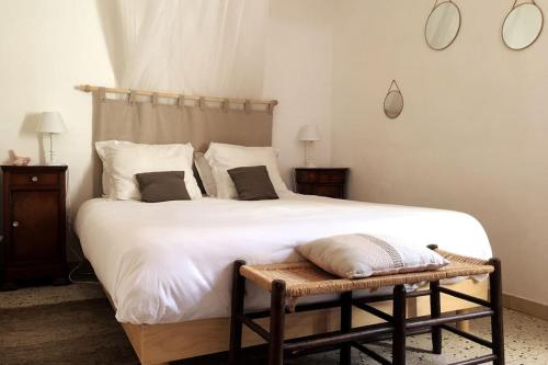 Postel nebo postele na pokoji v ubytování La maison des vendangeurs