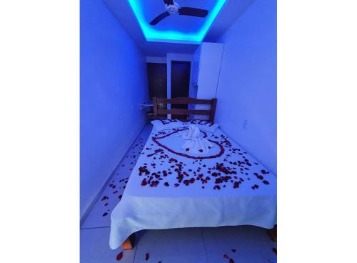 Ein Bett oder Betten in einem Zimmer der Unterkunft Pousada Ninho da Coruja